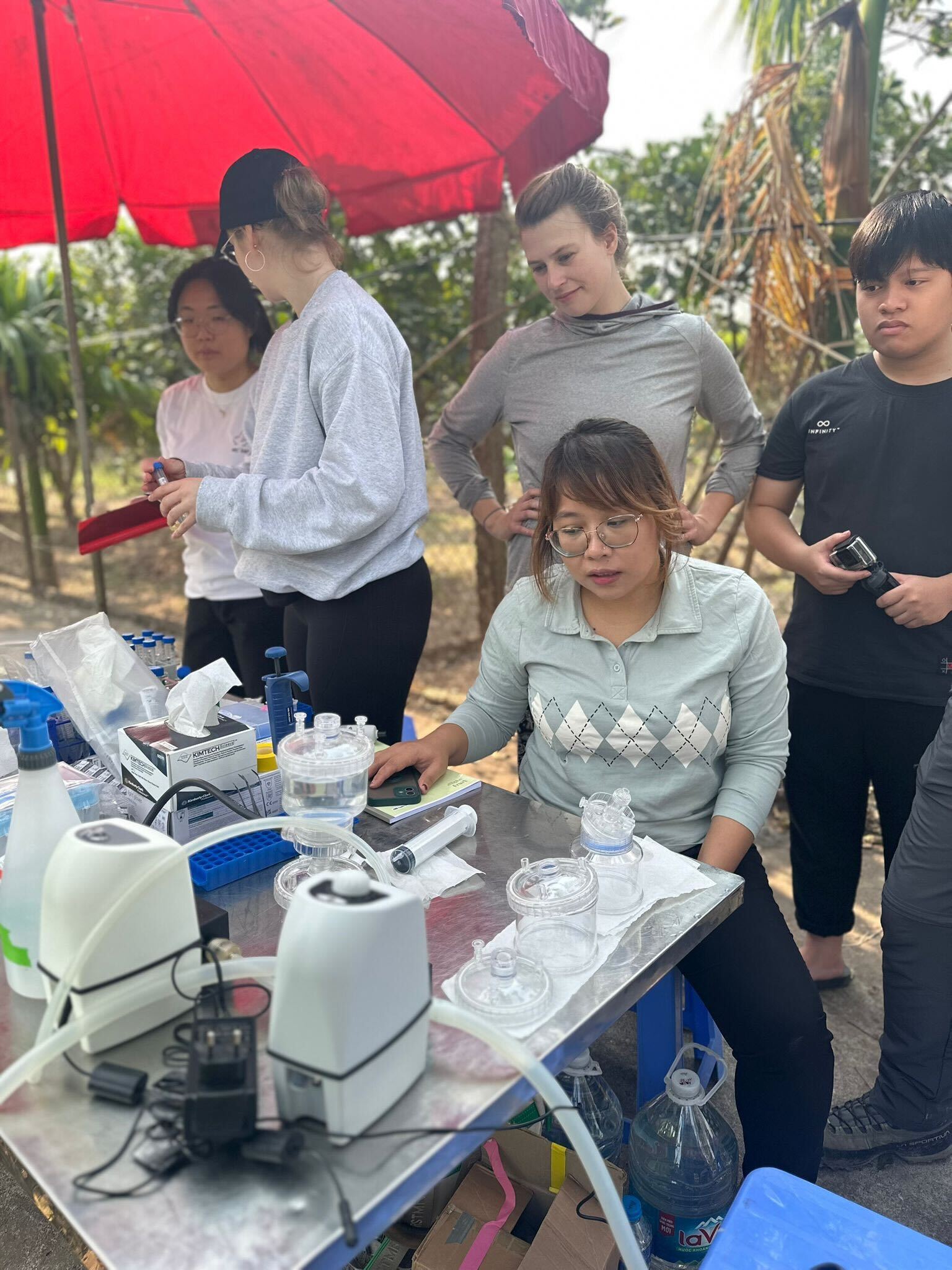 Our team doing field work in Hanoi, Vietnam.